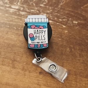 Happy Pills badge reel